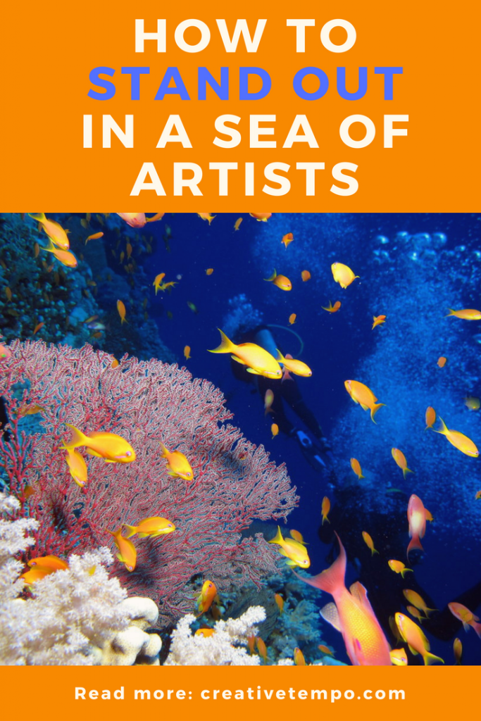 image of diver swimming with school of fish - How to Stand Out in a Sea of Artists graphic